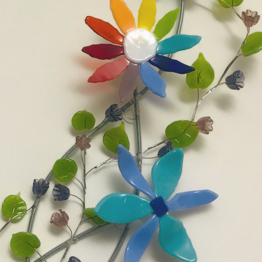 glass flowers and leaves