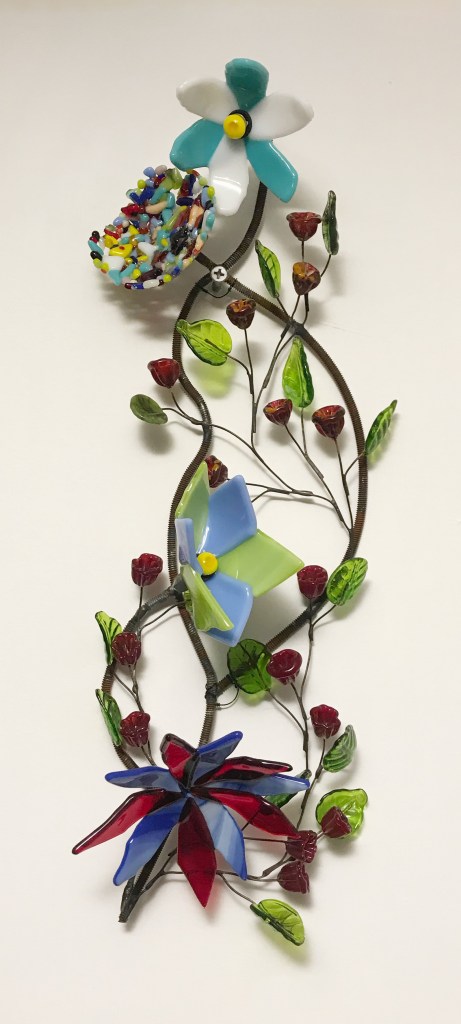 blue red and green glass flowers